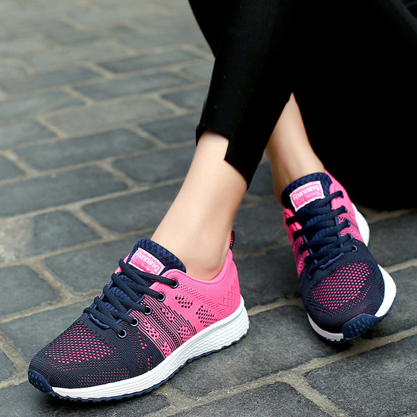 Women pink running sneakers